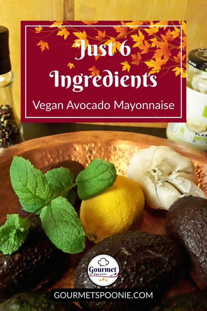 A copper bowl with fresh mint, a lemon, garlic, and avocados. Text above reads, Just 6 Ingredients: Easy Vegan Avocado Mayonnaise. A Gourmet Spoonie logo and website appear at the bottom.