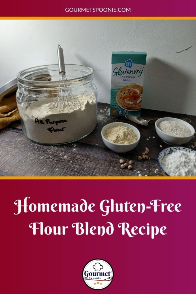 A jar labeled “All Purpose Flour” sits on a table with a whisk, surrounded by small bowls of flour, chickpeas, and a box of gluten-free flour blend. Text below reads Homemade Gluten-Free Flour Blend Recipe.