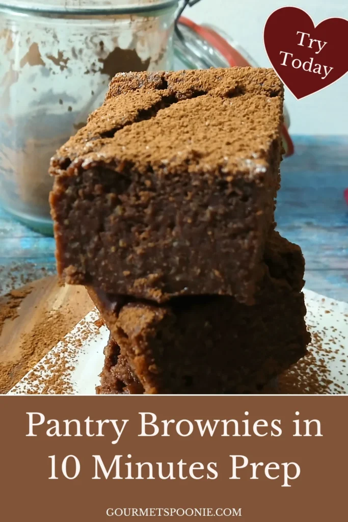 Three stacked gluten-free brownies dusted with cocoa powder sit on a white surface. In the background is a glass jar, and text on the image reads, Comfort in Every Bite. Indulge in gluten-free and dairy-free brownies made easy.