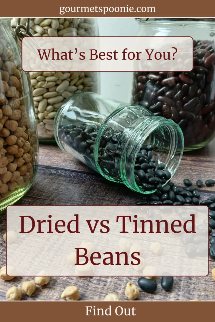 glass jars filled with dried beans with black beans spilling onto table