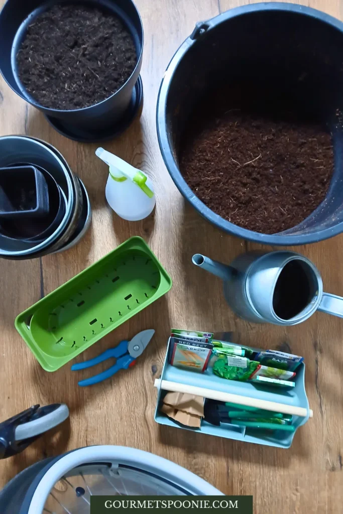 Self-watering plant pots and gardening tools arranged for an easy indoor gardening setup.