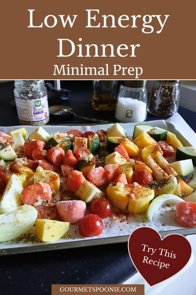 Chopped mixed vegetables in a baking dish ready to be roasted for an easy low effort traybake