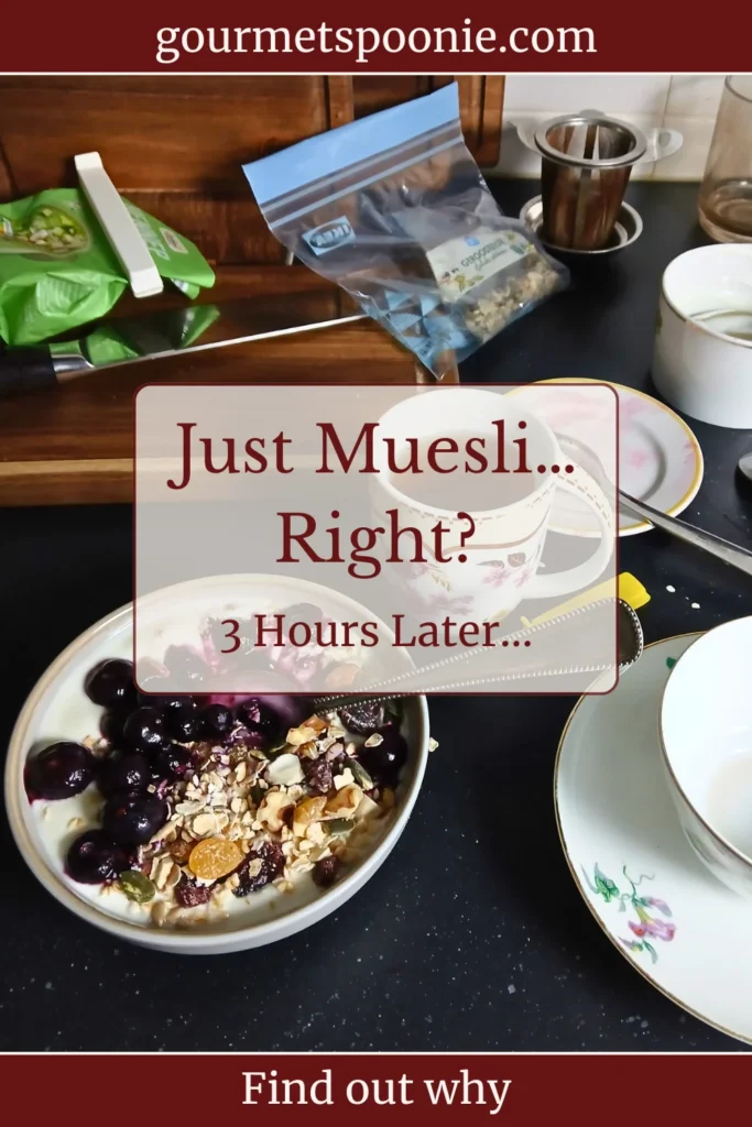 Bowl of yoghurt with muesli styled for photos, and a cluttered kitchen after a long cooking session