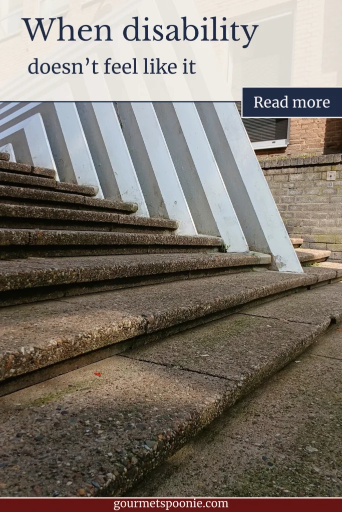 A set of concrete steps with a white railing and no wheelchair access is shown, illustrating a barrier for people with disabilities. Text reads: When disability doesn’t feel like it.