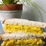 Chunky vegan egg salad sandwich filling made without tofu using chickpeas and gluten-free pasta.
