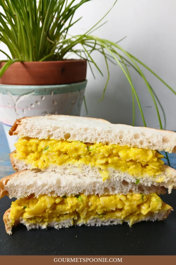 Chunky vegan egg salad sandwich filling made without tofu using chickpeas and gluten-free pasta.