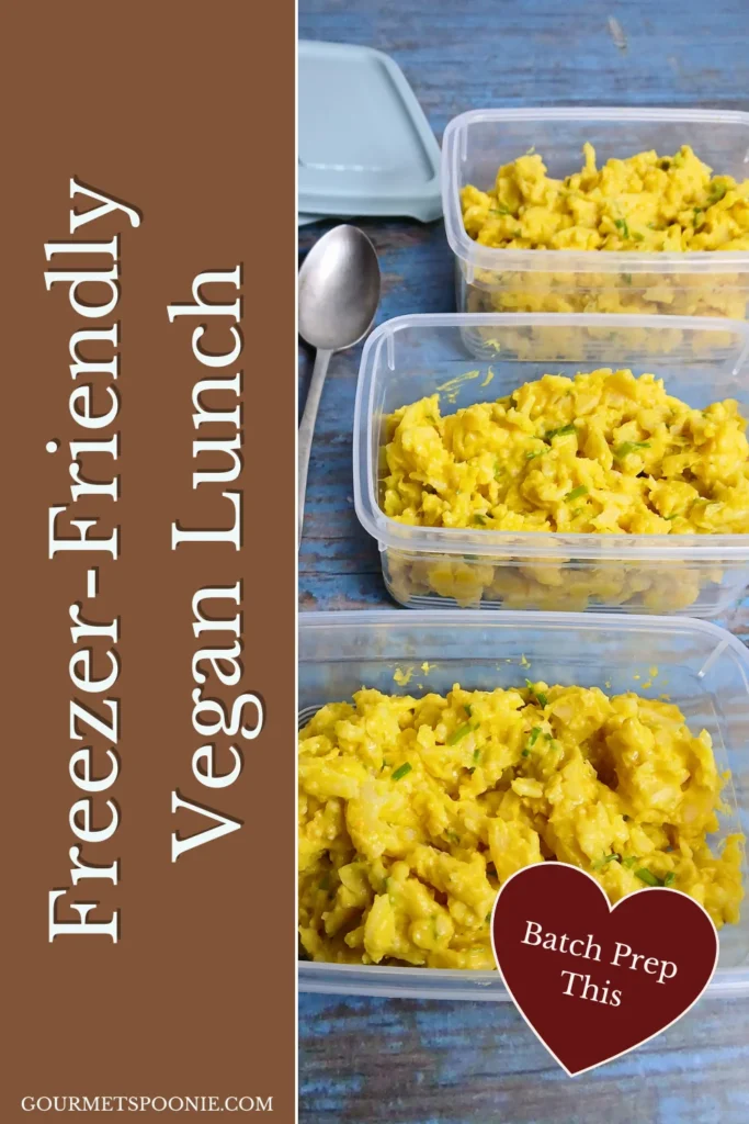 Freezer-friendly vegan chickpea egg salad portioned into meal prep containers for easy lunches.