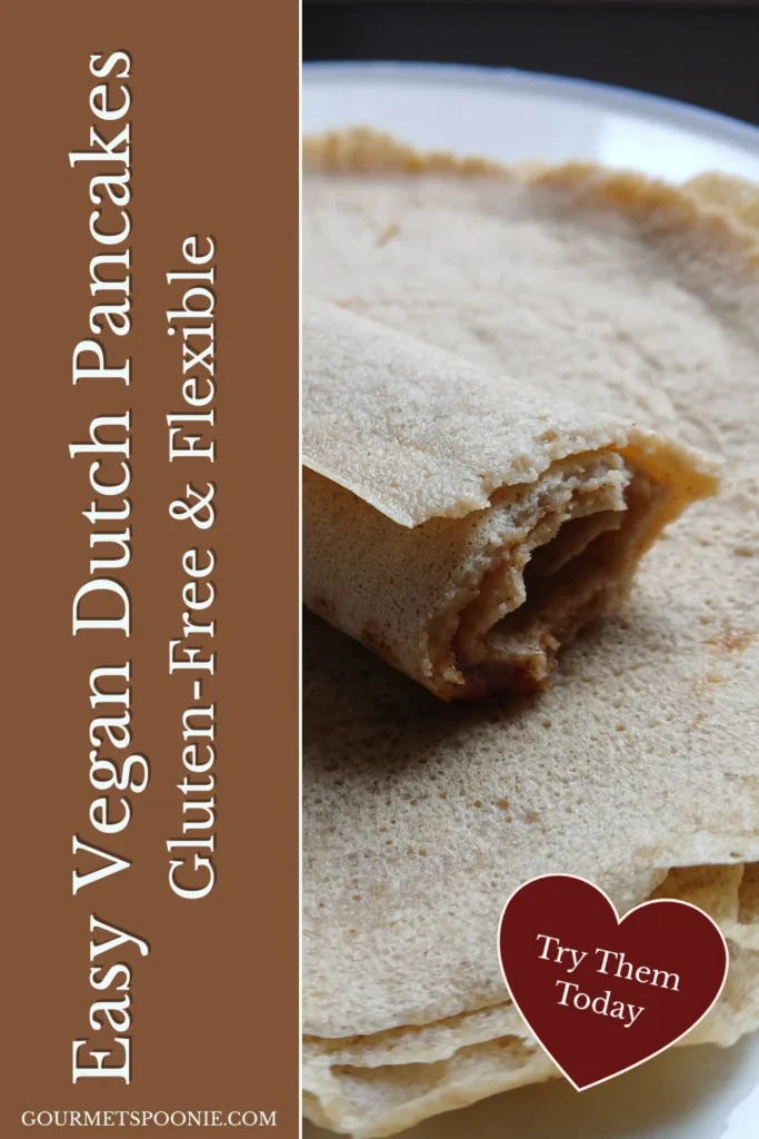 Thin gluten-free vegan Dutch pancake rolled on top of a small stack of pancakes.
