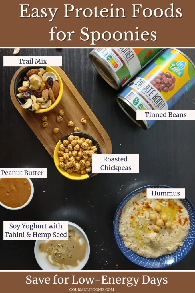 Low-effort plant-based protein foods including hummus, roasted chickpeas, soy yoghurt, crackers, and peanut butter.